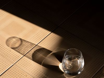 Abstract lighting reflecting on a studio floor.